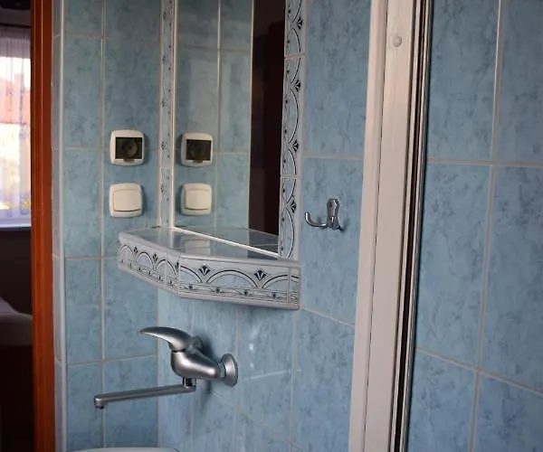 Δωμάτια σε οικογενειακή κατοικία Goscinne *